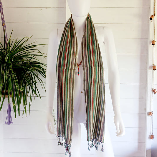 Immerse yourself in the alluring world of bohemian fashion with this delicate Indian Boho Scarf. Crafted with care, each scarf captures the essence of India's free-spirited charm, adding a touch of Boho elegance to your outfit. Whether draped effortlessly over your shoulders, wrapped as a headscarf, or styled with creative knots, this versatile accessory enhances your everyday fashion. Lightweight, breathable, and full of personality, it’s the perfect way to express your unique style.