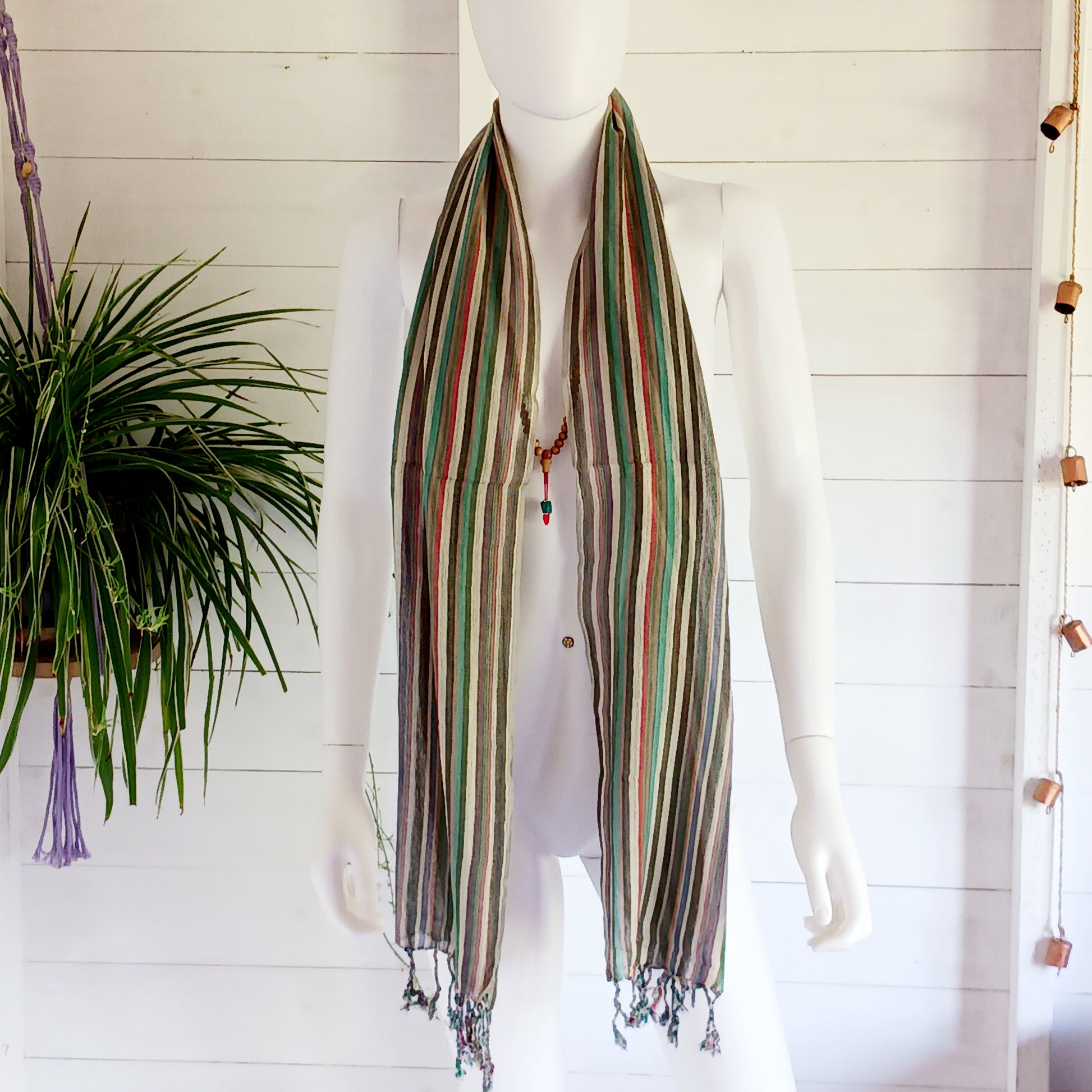 Immerse yourself in the alluring world of bohemian fashion with this delicate Indian Boho Scarf. Crafted with care, each scarf captures the essence of India's free-spirited charm, adding a touch of Boho elegance to your outfit. Whether draped effortlessly over your shoulders, wrapped as a headscarf, or styled with creative knots, this versatile accessory enhances your everyday fashion. Lightweight, breathable, and full of personality, it’s the perfect way to express your unique style.