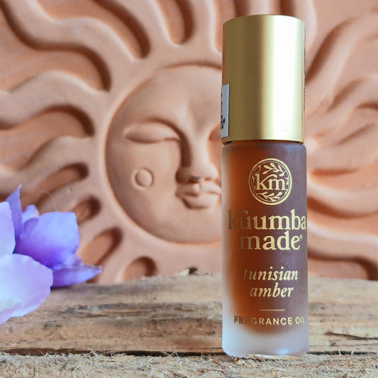 Discover the distinctive aroma of Kuumba Made Tunisian Amber Fragrance Oil, a captivating blend of spicy, sweet and warm fragrance notes. Oil-based and alcohol-free, this concentrated natural perfume creates a rich, long-lasting scent and a little goes a long way.