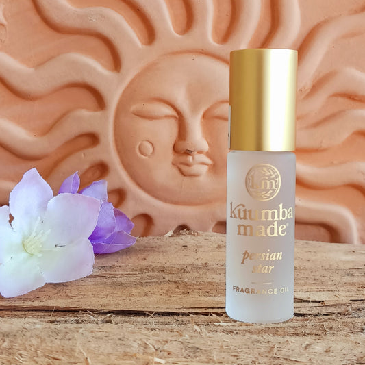 Experience the enchanting scent of Kuumba Made Persian Star Fragrance Oil, a beautifully balanced natural fragrance with a delicate, airy and green floral aroma. Fresh pear notes blend effortlessly with soft florals and clean, light amber to create a fragrance that evokes the warmth and beauty of a midsummer's day.