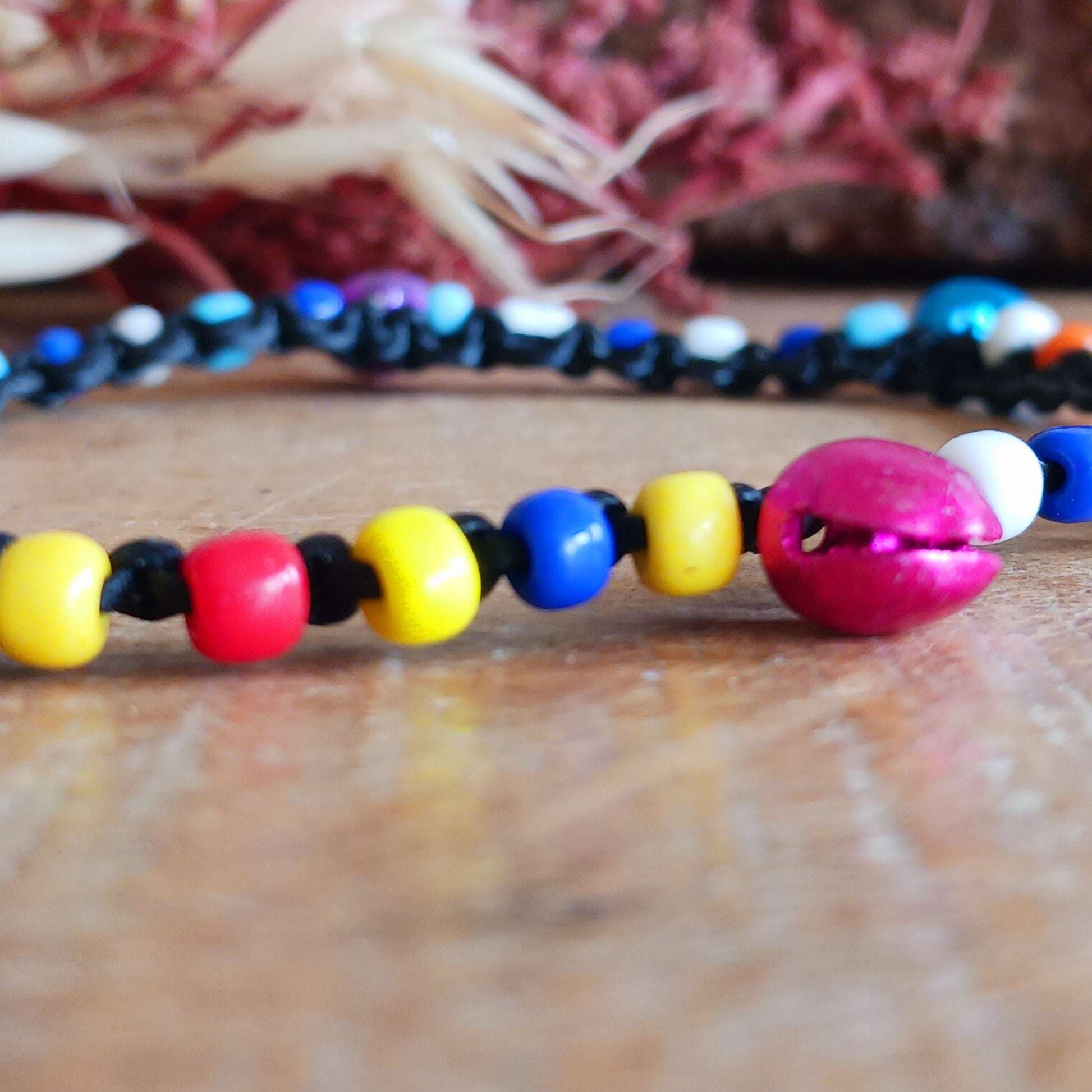 Add a playful touch to your look with these beautifully handmade Fairtrade jingle anklets from Thailand. Designed to bring both style and charm, each anklet features vibrant colours that instantly brighten any outfit.
