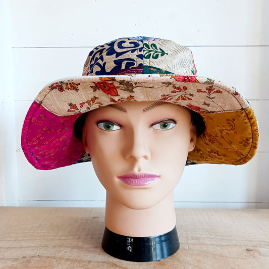 A swell little number for festivals and summer times, you'll look the coolest in this recycled sari patchwork sun hat. Black polyester lined, with a slightly flexible brim for adjusting the shape.