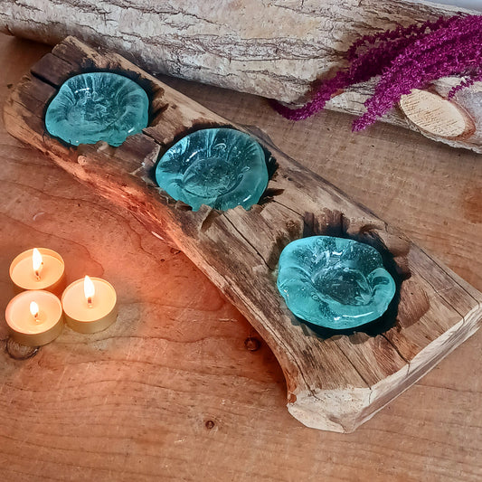 Bring nature into your home with this stunning handmade melted glass candle holder crafted in Bali. Each piece is truly one-of-a-kind, made from recycled glass hand-blown over whitewashed Balinese Gamal wood. As the molten glass cools, it moulds perfectly to the shape of the natural wood root, creating a unique balance of earthy and chic design. 