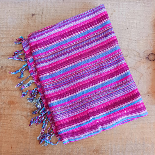 Immerse yourself in the alluring world of bohemian fashion with this delicate Indian Boho Scarf. Crafted with care, each scarf captures the essence of India's free-spirited charm, adding a touch of Boho elegance to your outfit.