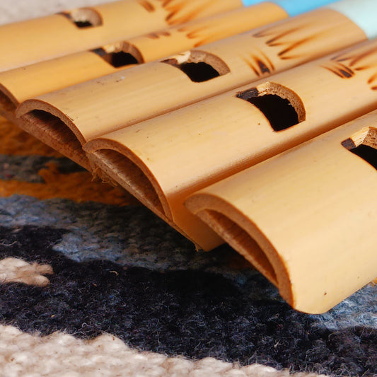 Introduce your little ones to the joy of music with these handcrafted pastel bamboo flutes. Available in three pretty colours, these fair trade instruments are an affordable and eco-friendly way to spark creativity, encourage musical play, and provide a delightful alternative to screen time. Each flute is carefully made from natural bamboo and hand-painted by skilled artisans, making every piece unique. Perfect as a gift or as a fun addition to your child’s toy collection.