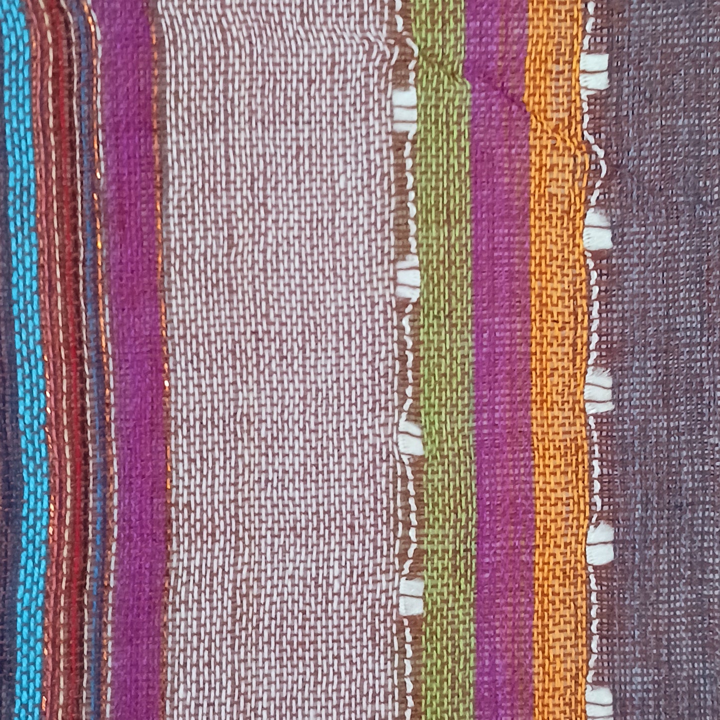 Immerse yourself in the alluring world of bohemian fashion with this delicate Indian Boho Scarf. Crafted with care, each scarf captures the essence of India's free-spirited charm, adding a touch of Boho elegance to your outfit. 