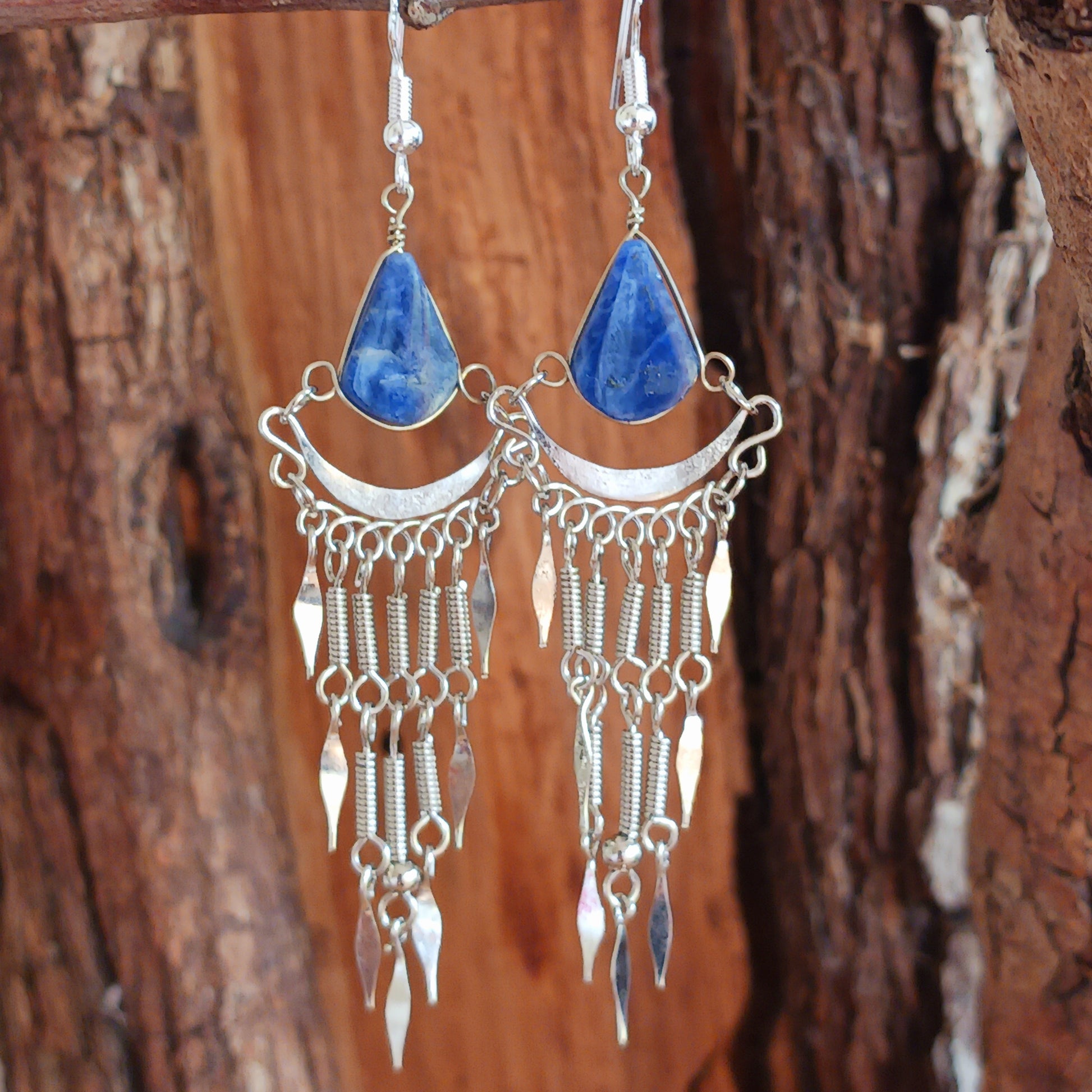 Add a touch of bohemian beauty to your look with these handmade Peruvian stone earrings. Featuring lapis lazuli stones and finished with silver-plated hooks, each pair is carefully crafted in small workshops in Peru.