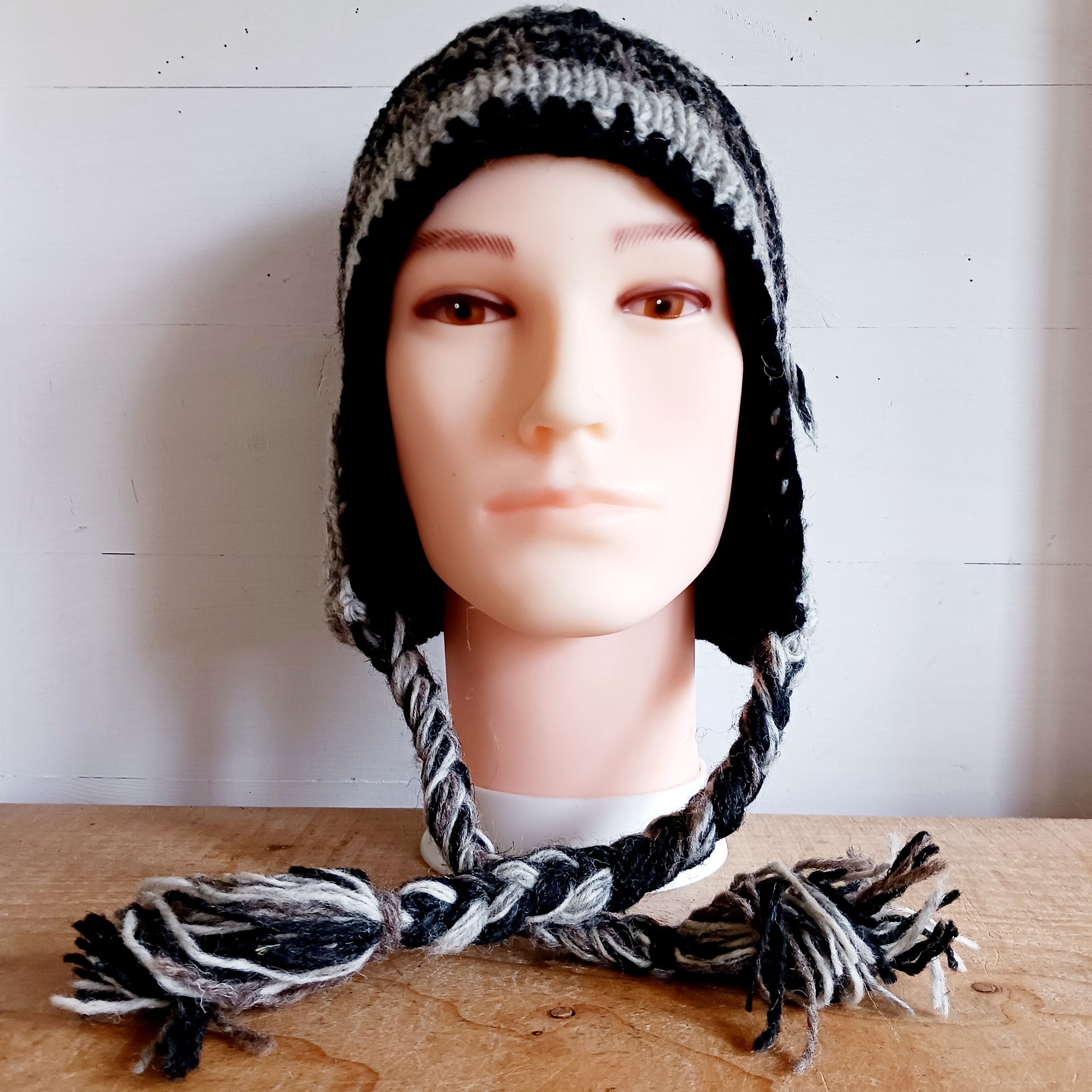 Stay cozy and stylish with our handmade chunky wool earflap hats, crafted in Nepal by skilled women artisans in Kathmandu. Each hat is 100% pure wool and features a soft polar fleece lining for extra warmth and comfort. Perfect for cold winter days, outdoor adventures, or adding a touch of handmade charm to your look.