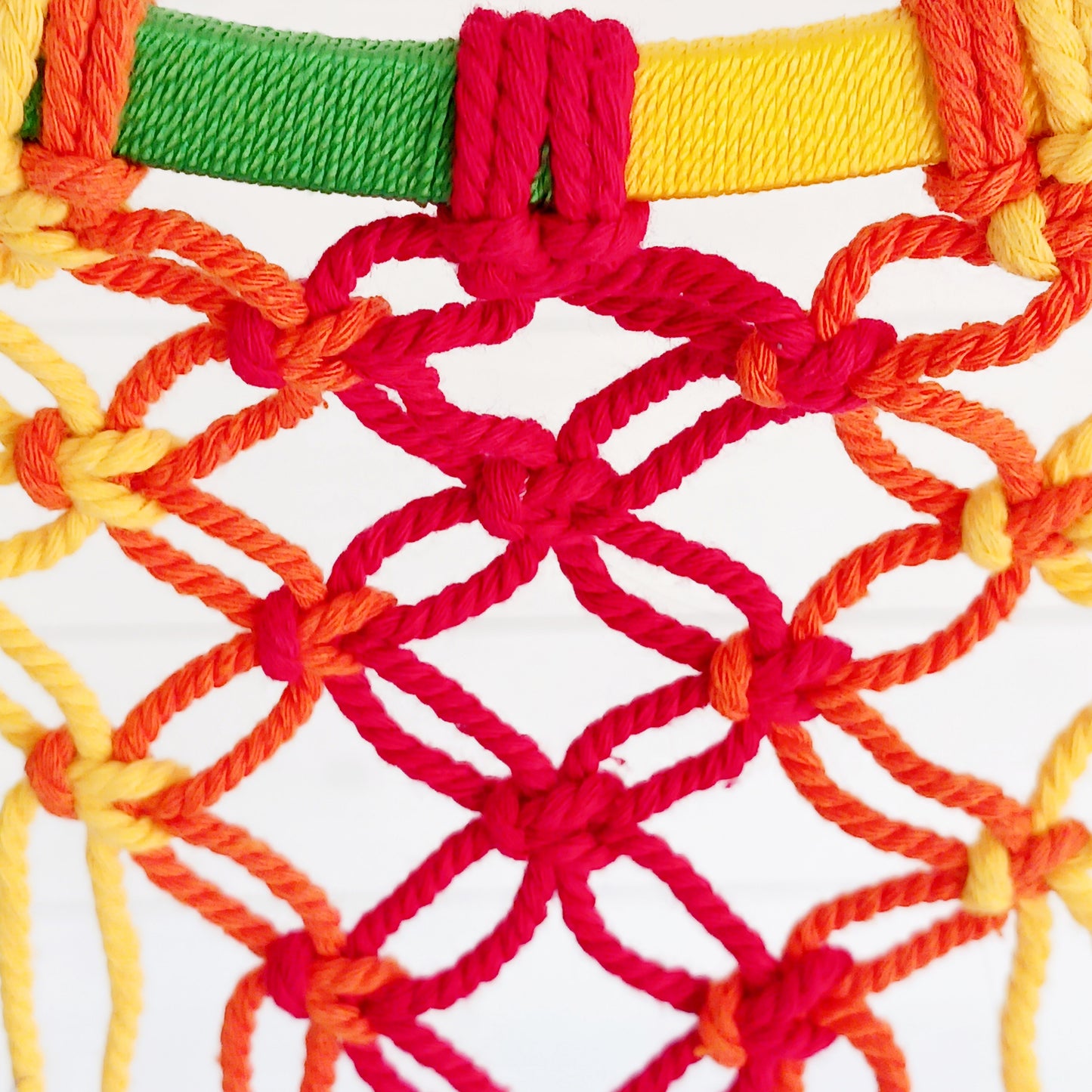 Bring harmony, colour, and positive energy into your space with this large, vibrant dreamcatcher. Featuring seven small hoops representing each of the chakras, this stunning piece is hand-crafted with bright rainbow crocheting. Ideal as a wall hanging, it makes a thoughtful gift for yoga lovers, meditation enthusiasts, or anyone seeking balance and wellbeing. Perfect for adding a spiritual touch to your home décor while promoting peace and positivity.