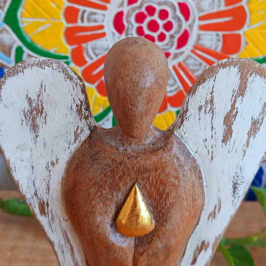 Hati-Hati wooden angels are hand carved in mountain villages in Indonesia from Suar-wood a sustainable hardwood. This wood is used to create beautiful and often sacred images.

