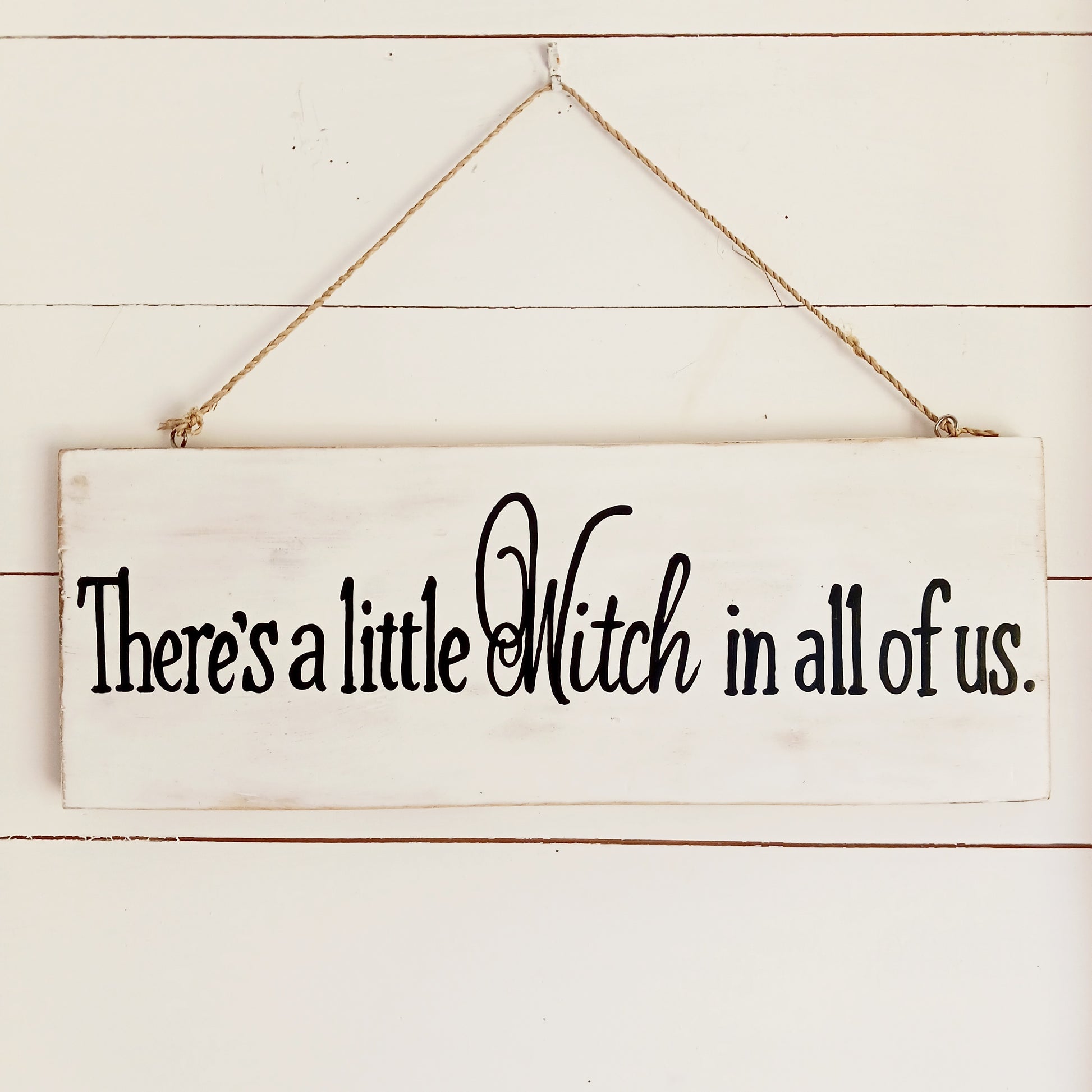 Celebrate your magical side with the There's a Little Witch in All of Us Wooden Wall Plaque. Featuring the enchanting quote, "There's a little Witch in all of us," this decorative wooden sign is a charming reminder to embrace your intuition, confidence, and unique spirit