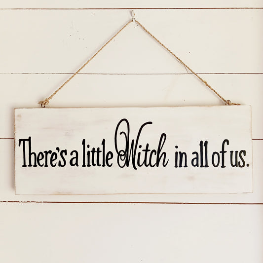 Celebrate your magical side with the There's a Little Witch in All of Us Wooden Wall Plaque. Featuring the enchanting quote, "There's a little Witch in all of us," this decorative wooden sign is a charming reminder to embrace your intuition, confidence, and unique spirit