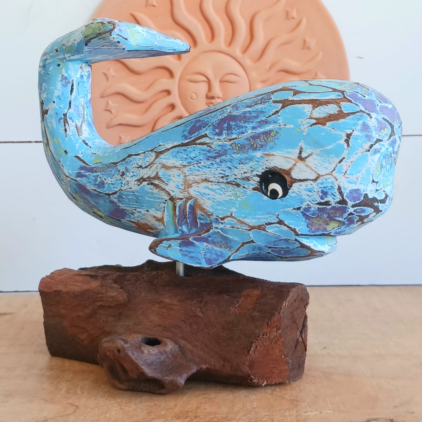 Bring the beauty of the coast into your home with this charming Colourful Wooden Whale. Handcrafted with a rustic finish and vibrant colours, this decorative wooden whale captures the relaxed spirit of seaside living. Whether displayed in a living room, bathroom, hallway, beach house, or coastal-themed space, it adds warmth, character, and nautical charm to your décor.