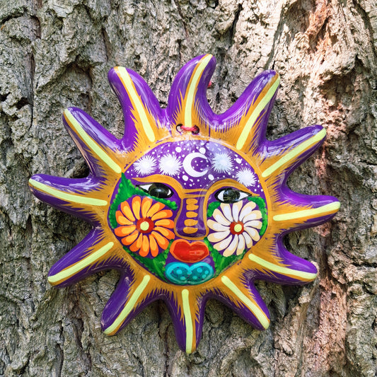 This sunny and vibrant wall plaque will get you smiling! It has been beautifully hand painted in a bright style traditional to Xalitla, a region of Guerrero, Mexico. A striking glaze adds to the bold design. It has two holes which can be used to add a hanging loop for an easy display.