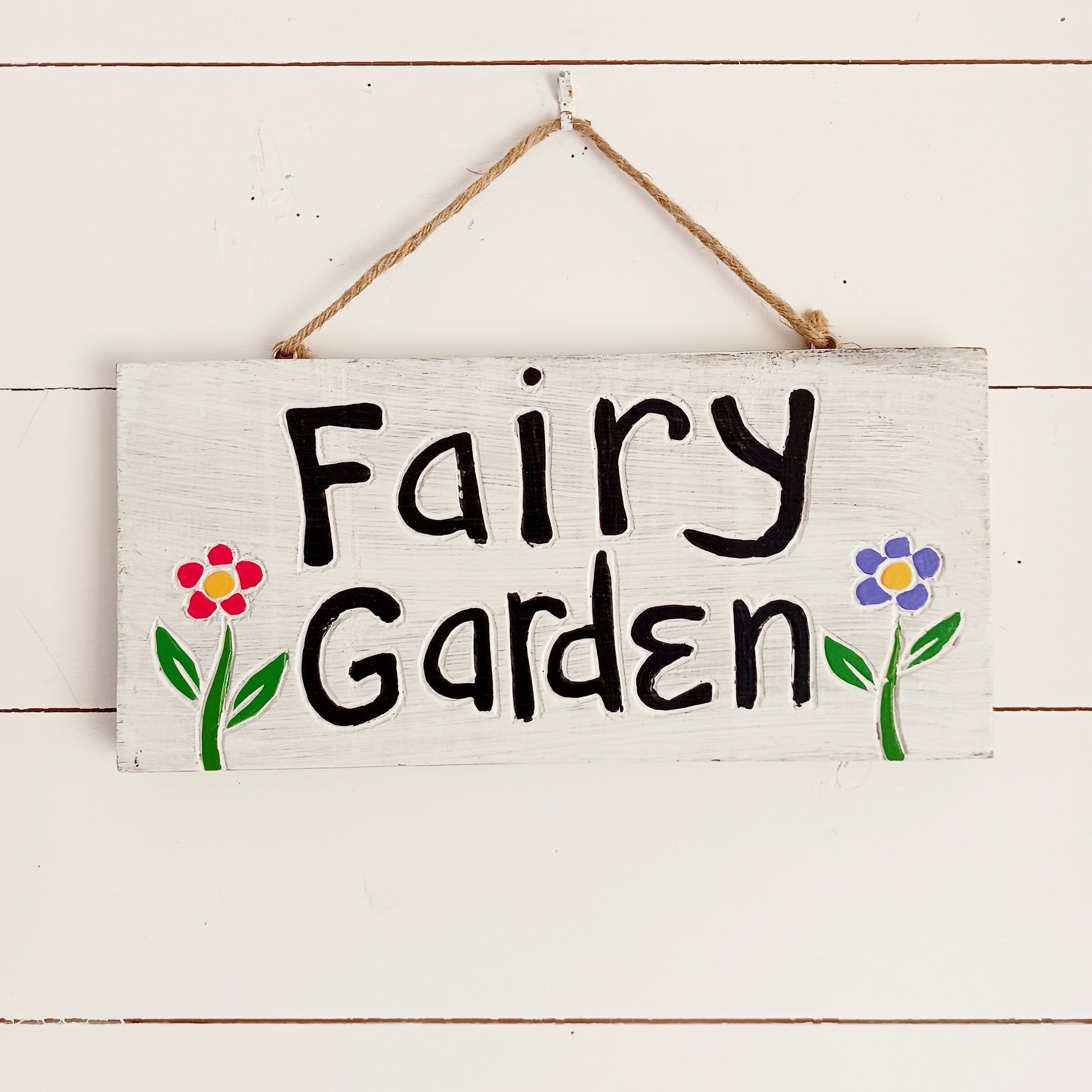 Bring a touch of magic to your home or garden with our Fairy Garden Wall Plaque. Beautifully crafted with simple details, this decorative plaque is the perfect addition to any fairy garden, patio, balcony, fence, or indoor living space.