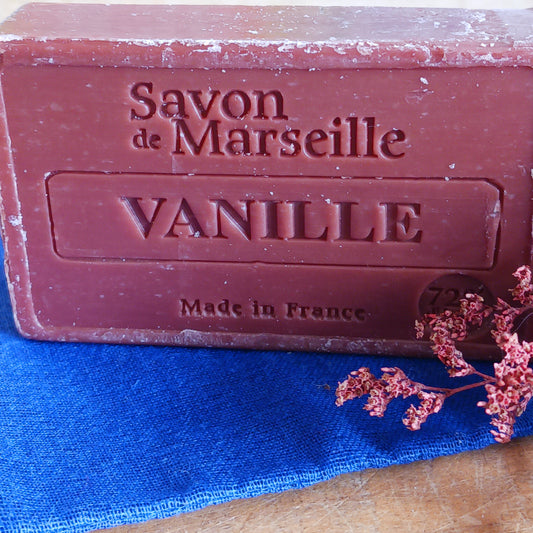 Indulge your skin with our Natural Marseille Vanilla Soap, handcrafted in the heart of Provence by artisans at Le Chatelard’s workshops in St Auban sur Ouvèze, France. Infused with pure vanilla essence, this luxurious soap combines the soothing power of coconut oil, the nourishing softness of olive oil, and the deep moisturizing benefits of sweet almond oil.