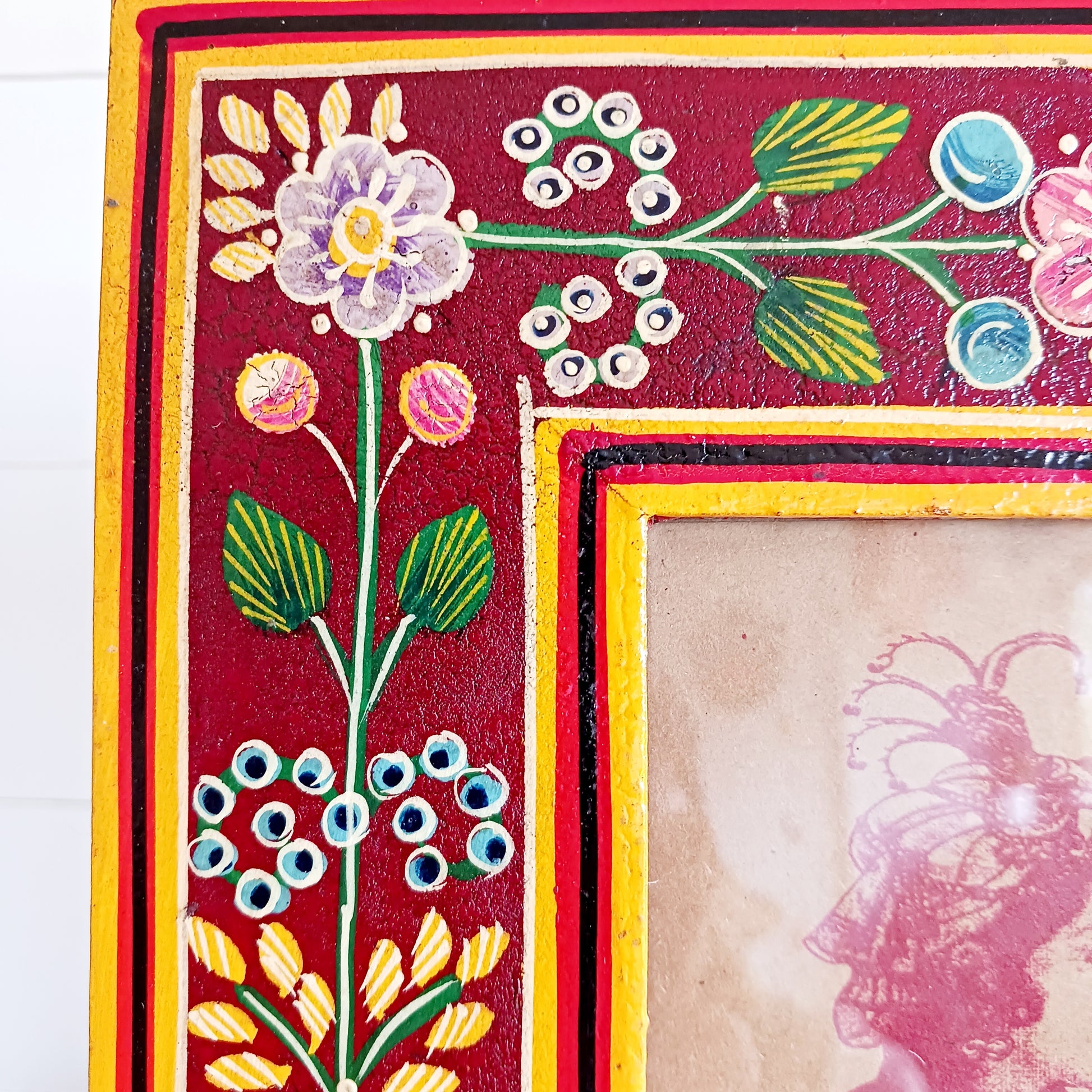 Add a touch of artisan charm to your home with this beautifully handcrafted mango wood photo frame. Made from sustainably sourced mango wood, each frame is carefully hand painted by skilled Indian artisans, featuring vibrant floral patterns that create a stunning tapestry of colour.
