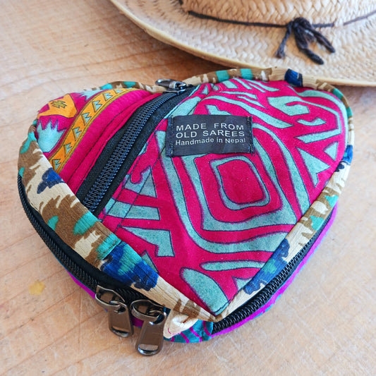 These nifty fold up backpacks are super handy. Not only do they fold down and zip away into a small compact size, but they have multiple zip and button up pouches and pockets for you to keep your essentials.