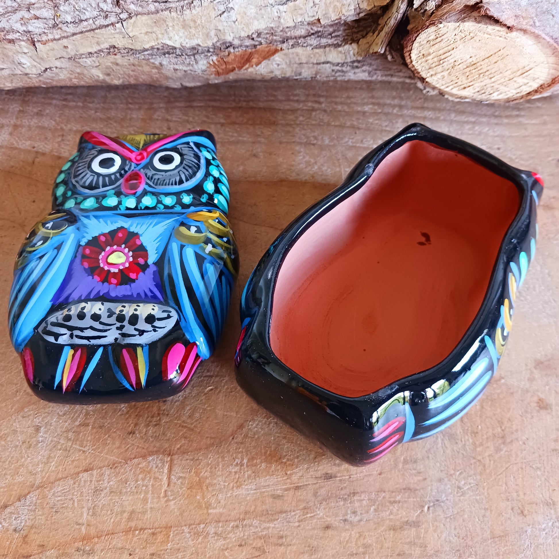 Bring a burst of colour and culture into your home with this beautifully hand-painted owl trinket pot, a unique piece that blends functionality with traditional artistry.