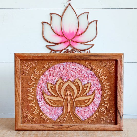 Keep your cherished items safe in this beautifully crafted mango wood jewellery box, engraved with the word ‘Namaste’. A Sanskrit greeting meaning “the divine in me greets the divine in you,” it serves as a daily reminder of connection, presence, and mutual respect. Accented with rose quartz—symbolizing love, compassion, and emotional healing—this box is ideal for storing jewellery, keepsakes, cards, or other personal treasures. Subtle, spiritual, and thoughtful, it’s a meaningful addition to any space.
