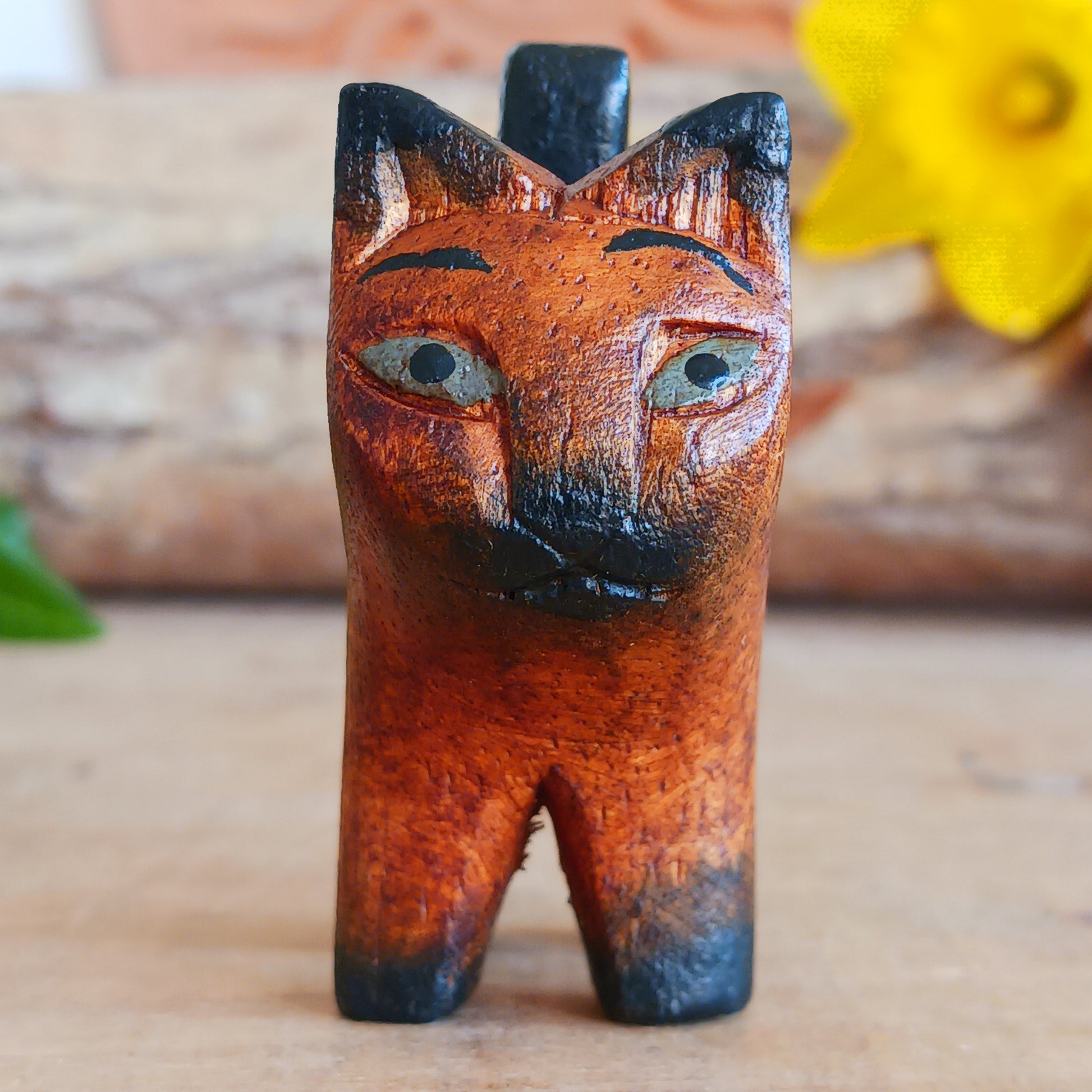 Bring warmth and charm to your home with this hand carved rustic mini cat, a delightful wooden figurine full of personality. Carefully crafted from Jempinis wood, each tiny cat is individually carved by skilled artisans in Indonesia and finished with subtle painted details that give every piece its own unique character.