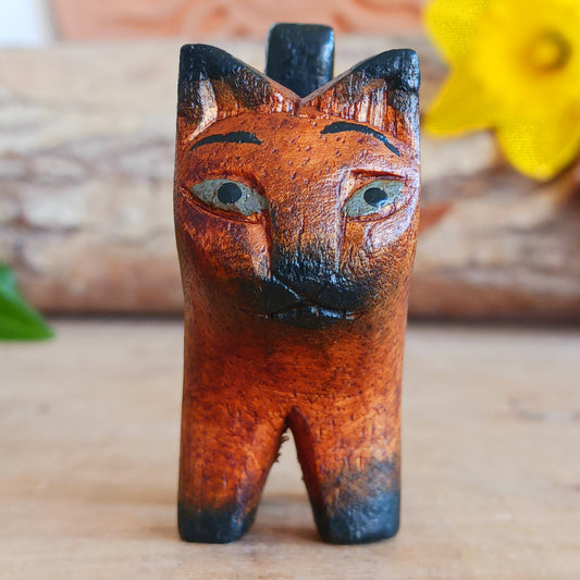 Bring warmth and charm to your home with this hand carved rustic mini cat, a delightful wooden figurine full of personality. Carefully crafted from Jempinis wood, each tiny cat is individually carved by skilled artisans in Indonesia and finished with subtle painted details that give every piece its own unique character.