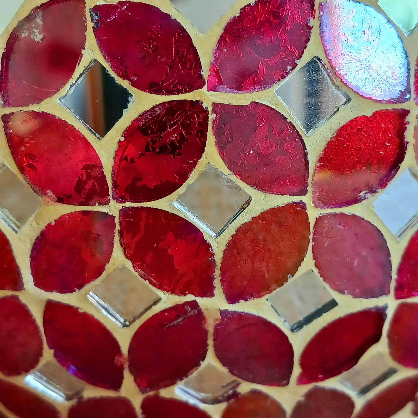 Add a warm, colourful glow to your home with this large and beautiful handmade Meena mosaic glass tealight holder, crafted by a World Fair Trade Organisation (WFTO) approved supplier in India.