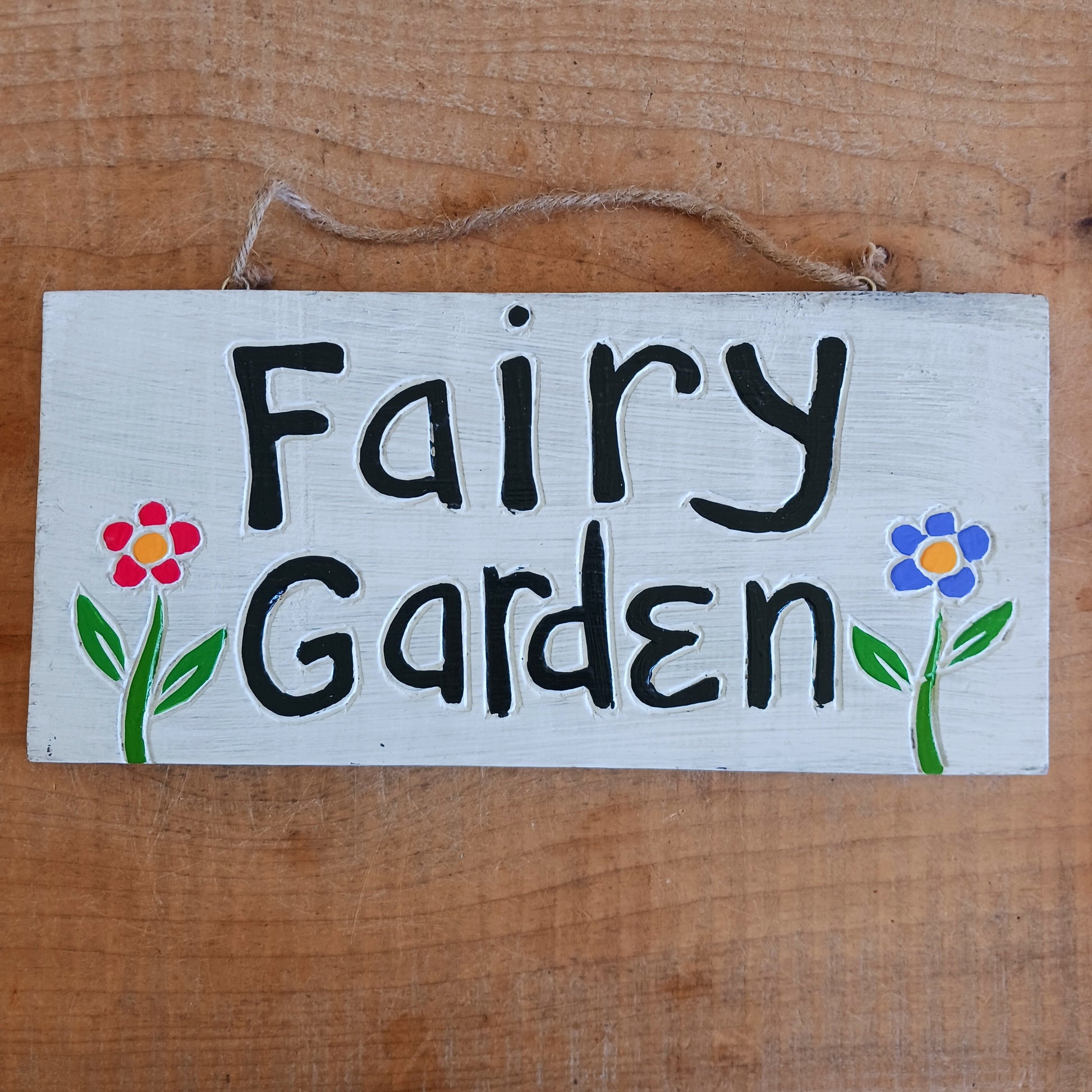 Bring a touch of magic to your home or garden with our Fairy Garden Wall Plaque. Beautifully crafted with simple details, this decorative plaque is the perfect addition to any fairy garden, patio, balcony, fence, or indoor living space.