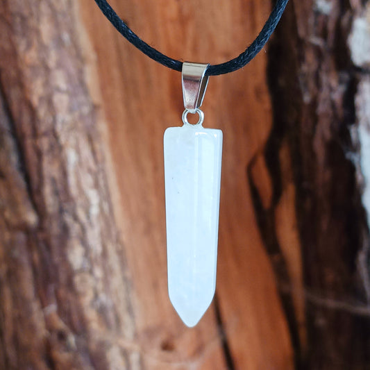 Embrace the natural power of rock crystal with this elegant pendant on a sleek black cord necklace. Known as a master healing stone, rock crystal energises the body, purifies the aura, and enhances inner strength. 
