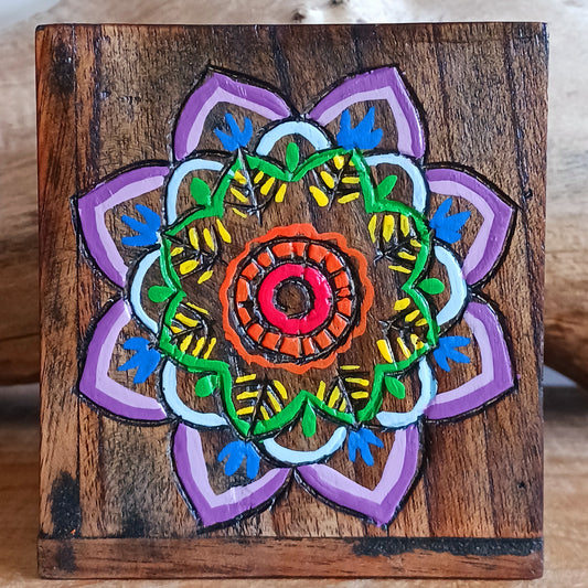 Add a burst of colour and joy to your space with this Hand Painted Mandala Wooden Pots Set, handmade in Indonesia and Fairtrade certified. Each pot is carefully painted by skilled artisans, making every set unique and full of character.