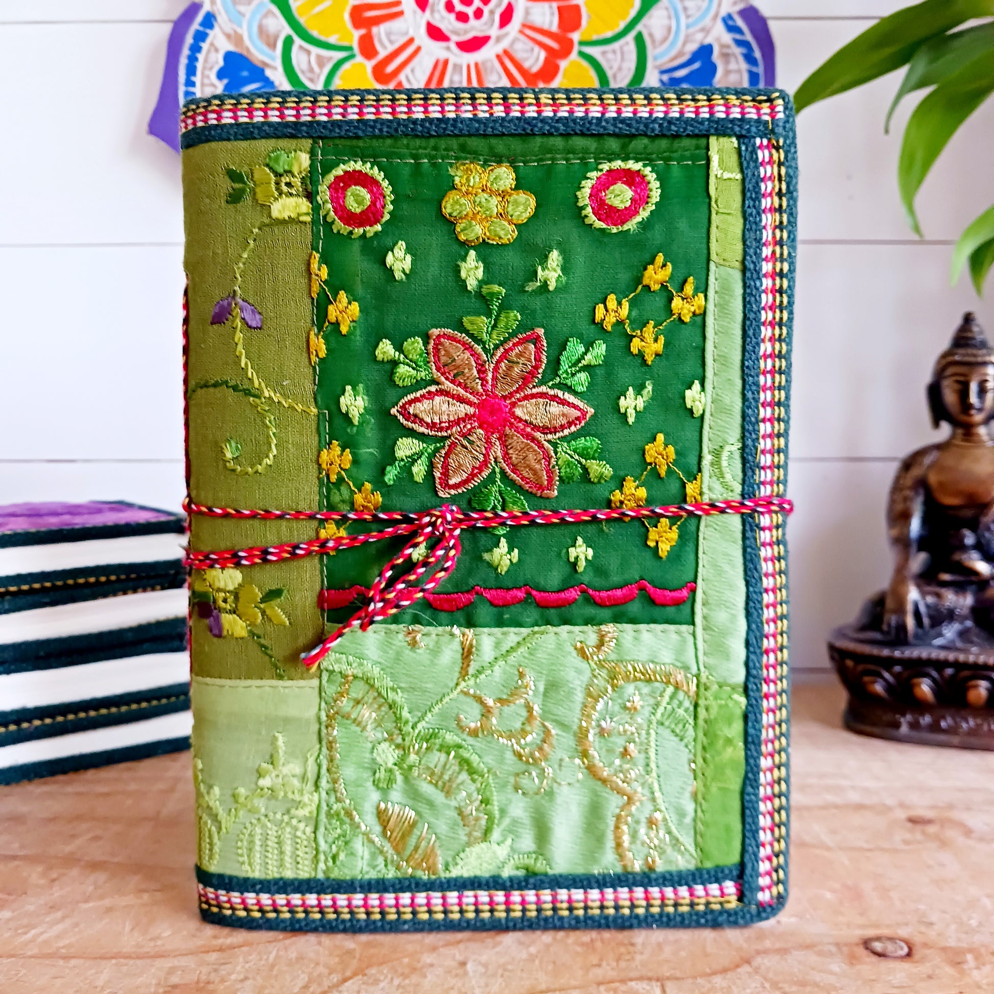 This beautifully bound notebook with handmade paper is from recycled cotton. An imaginative use for sari offcut material, the cover is edged and framed with pretty brocade material to complete a lovely and unique eco friendly stationery gift.