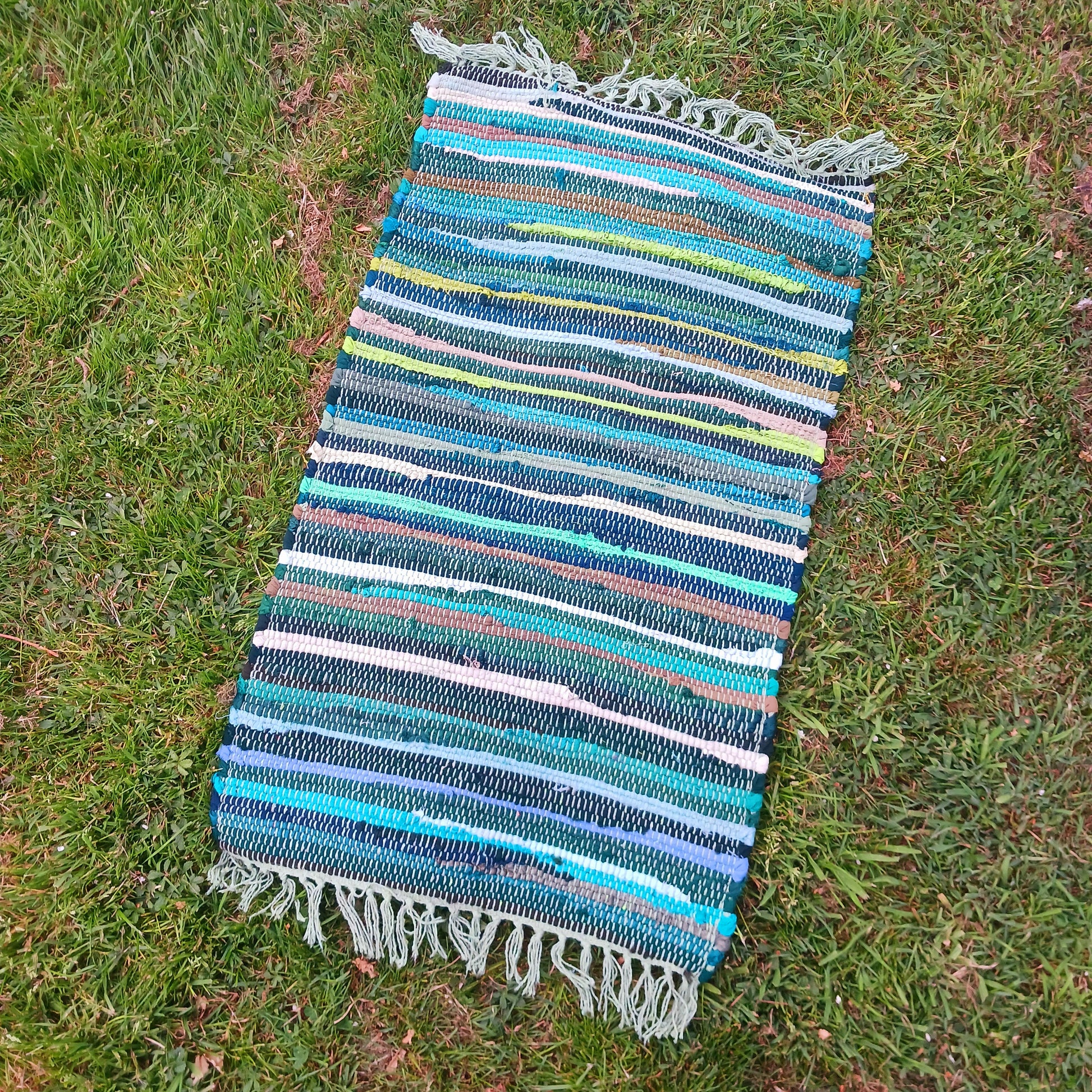 Enhance your living space with this premuim quality rag rug.  Whether used in kitchens, bathrooms, or even as a decorative accent in bedrooms and living rooms, the natural green tones will bring a sense of serenity and freshness to any environment.