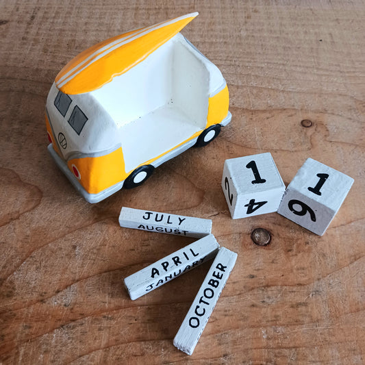 Bring the feeling of endless summer into your space with this cute yellow and white Camper & Surfboard Perpetual Calendar. Featuring a retro-inspired camper with a surfboard on top, this design captures the spirit of freedom, adventure, and life on the open road.