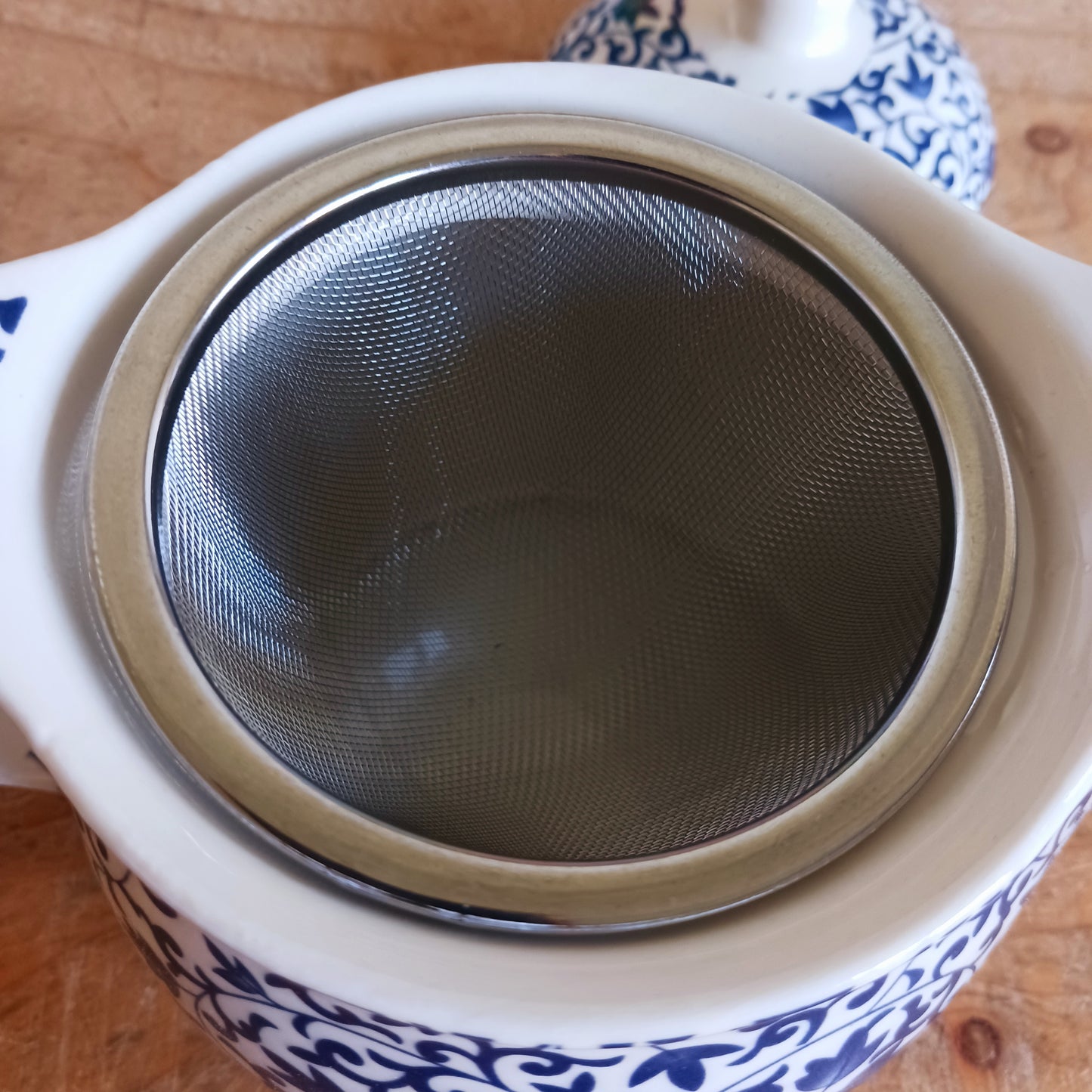 Add timeless elegance to any tea ritual with this Small Herbal Teapot featuring a stunning blue pattern design. Inspired by traditional Eastern aesthetics, this beautifully crafted teapot blends cultural symbolism with everyday functionality, making it an exceptional gift.