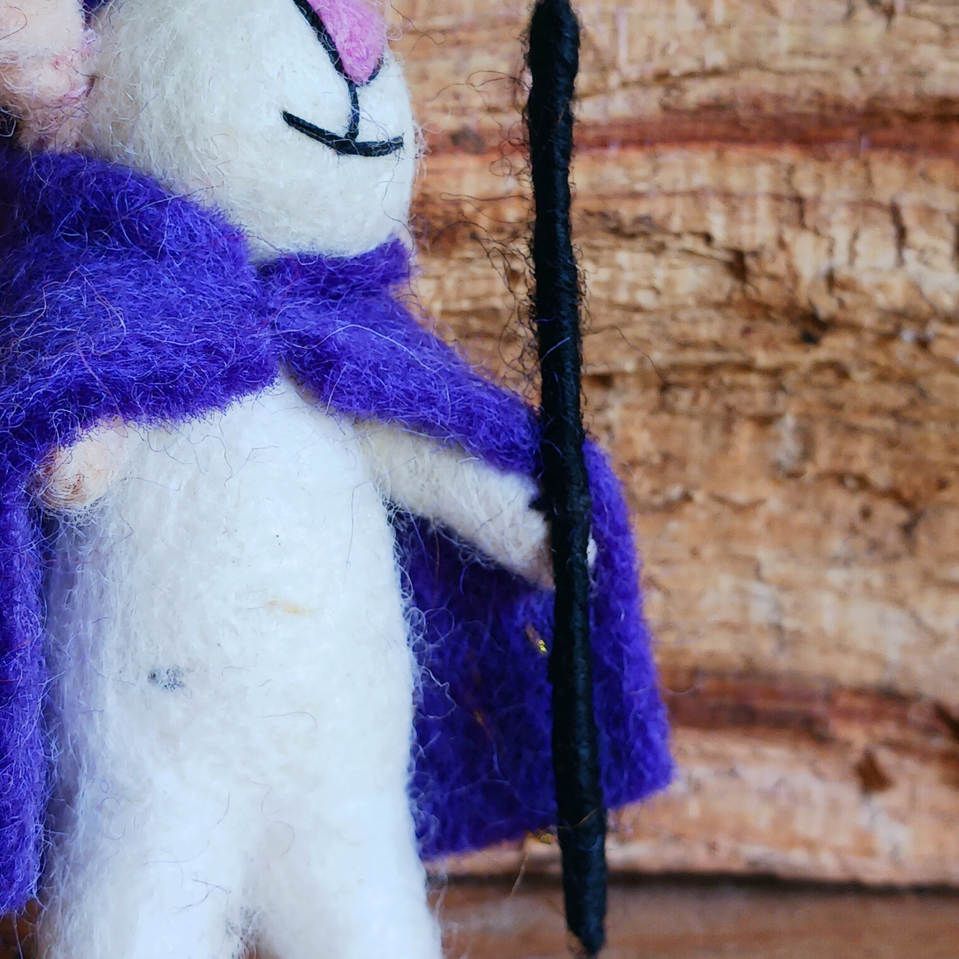 Bring a touch of handcrafted Halloween charm to your home with these delightful felted mice dressed as a Wizard character. Each mouse features adorable details including long tails, soft pink ears and noses, and colourful pointed hats and capes. The Wizard style is elegantly finished with gold star embroidery for extra magical flair.