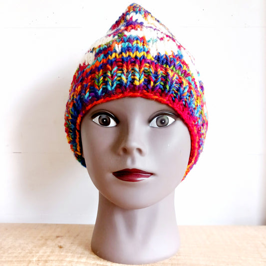 Chunky wool beanie hats hand made in Nepal with fleece lining for extra warmth and comfort, this handmade hat is awesomely warm. These knitted beanie hats have a rolled brim, a warm lined interior and are available in mixed colours.