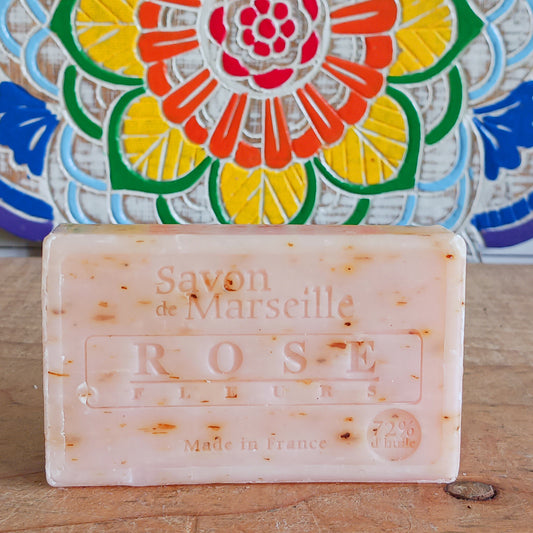 Indulge your senses with our Natural Marseille Rose Petal Soap, handmade in the heart of Provence. Infused with real rose petals and a captivating floral aroma, this luxurious soap envelops your skin in an intense, long-lasting rose scent.