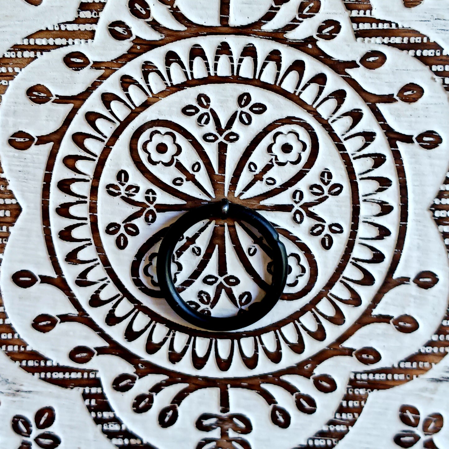 Bring balance and beauty to your space with this handcrafted mango wood drawer cabinet, featuring an intricate mandala design on the front panels. Perfect for organising your wellness accessories, stationery, jewellery, or essential oil droppers, this piece combines practicality with mindful artistry. 