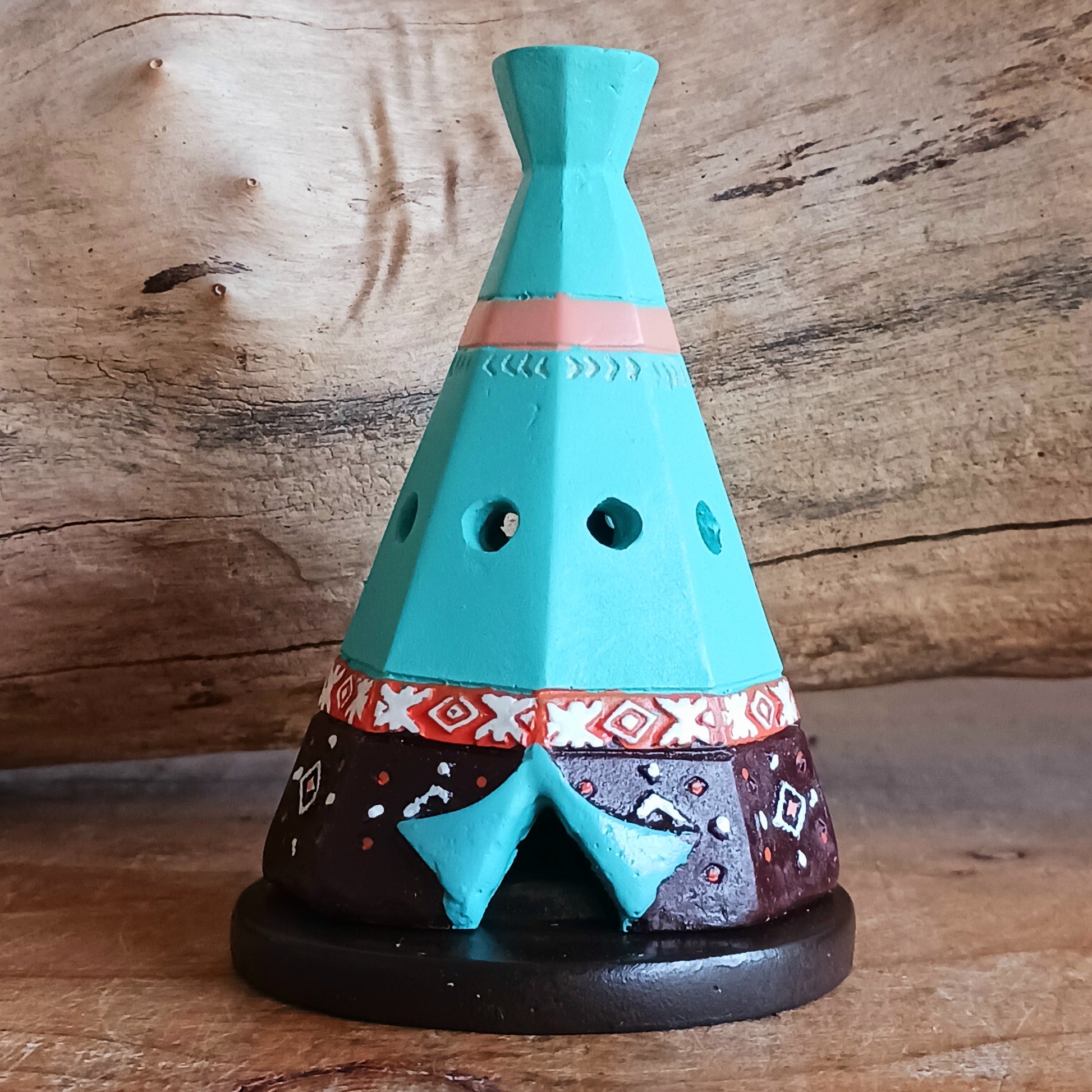 This cool tipi cone burner is a fantastic addition to any home. Bright and colourful and when a cone is placed inside, the smoke escapes through the top of the tipi.