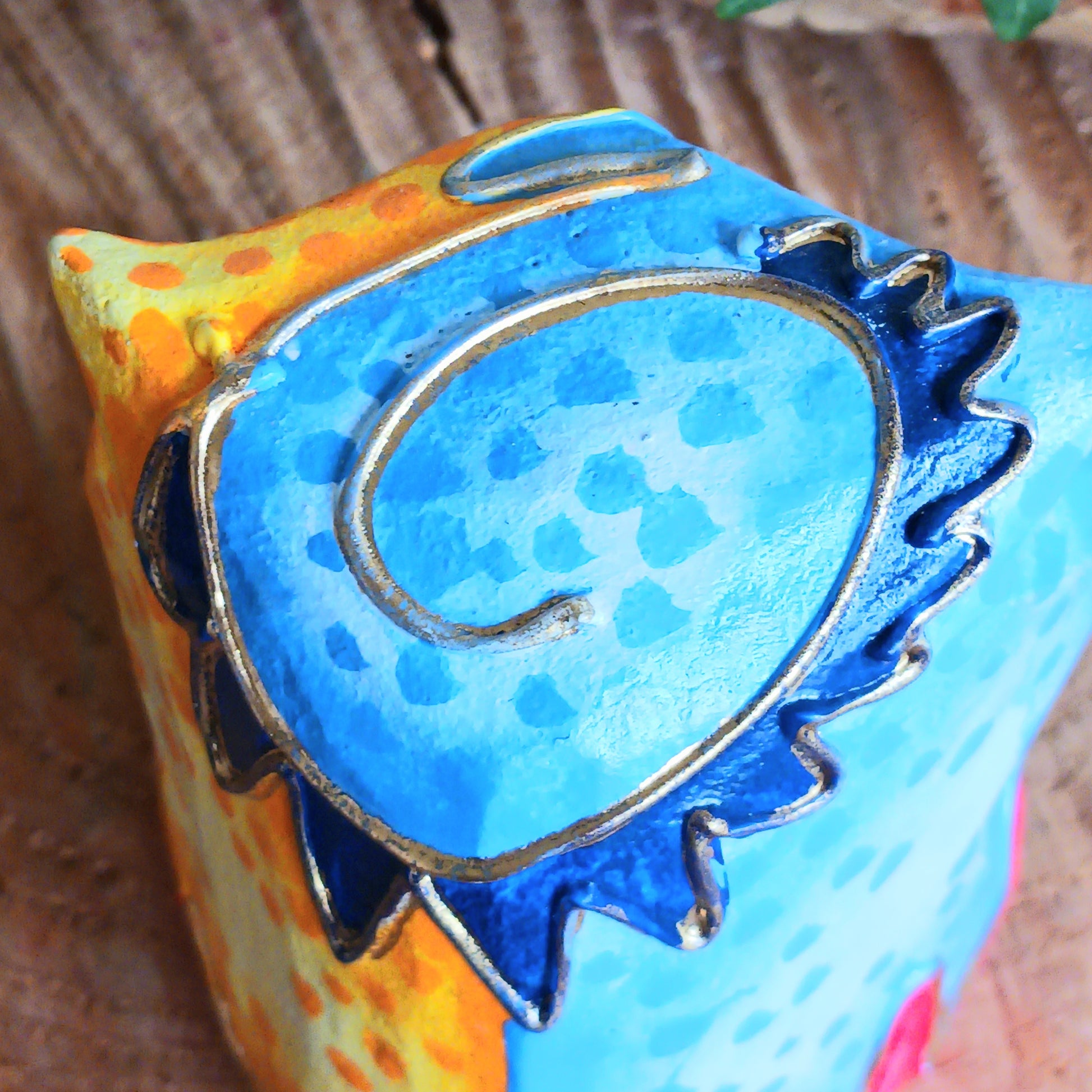 Add a pop of colour to your home décor with these beautifully hand painted Psychedelic Owls. These vibrant and quirky owl figurines instantly brighten any room with their playful charm.