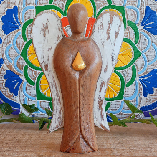 Hati-Hati wooden angels are hand carved in mountain villages in Indonesia from Suar-wood a sustainable hardwood. This wood is used to create beautiful and often sacred images.
