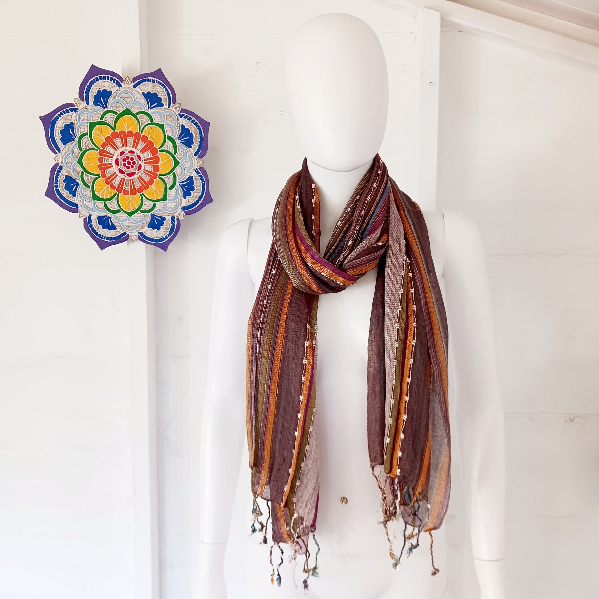 Immerse yourself in the alluring world of bohemian fashion with this delicate Indian Boho Scarf. Crafted with care, each scarf captures the essence of India's free-spirited charm, adding a touch of Boho elegance to your outfit. 
