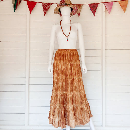 This beautiful Indian crinkle skirt is lovely and light so you can move with ease and comfort on a sunny day or a hot night. Made from rayon crepe, you can’t go wrong with this lovely skirt, it will add to your flowing summer style. And as rayon is quick drying, it also makes this a great beach cover up skirt.
