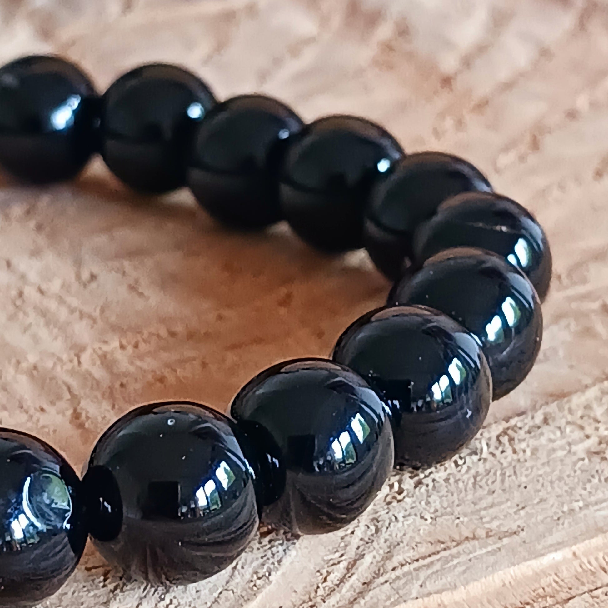 Elevate your style and spirit with this stunning Black Agate Power Bracelet. Beautifully crafted, it complements any outfit with its sleek and elegant design. More than just an accessory, Black Agate is known as the stone of protection, success, and courage. It’s believed to shield against stress, negative energy, and bad dreams—bringing calm and strength to your day.