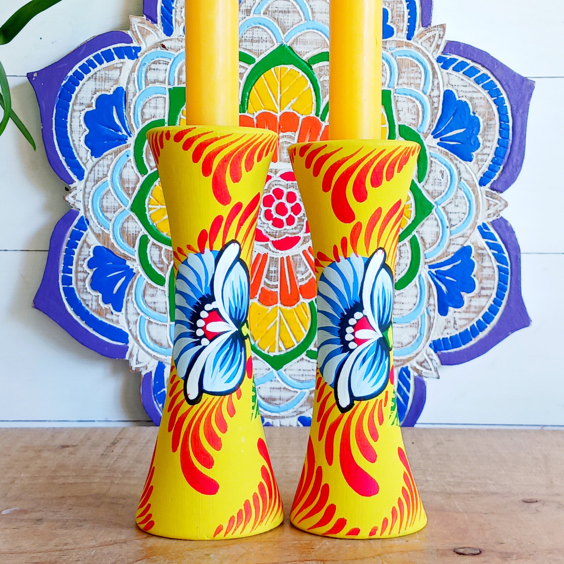 Bring a burst of colour and meaning to your home with this&nbsp;handcrafted terracotta candle holder. Made on a traditional pottery wheel using natural, chemical-free, sustainable clay, each piece celebrates the artistry of Bangladeshi craftsmanship.