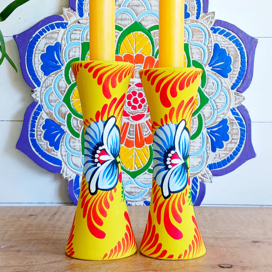 Bring a burst of colour and meaning to your home with this&nbsp;handcrafted terracotta candle holder. Made on a traditional pottery wheel using natural, chemical-free, sustainable clay, each piece celebrates the artistry of Bangladeshi craftsmanship.
