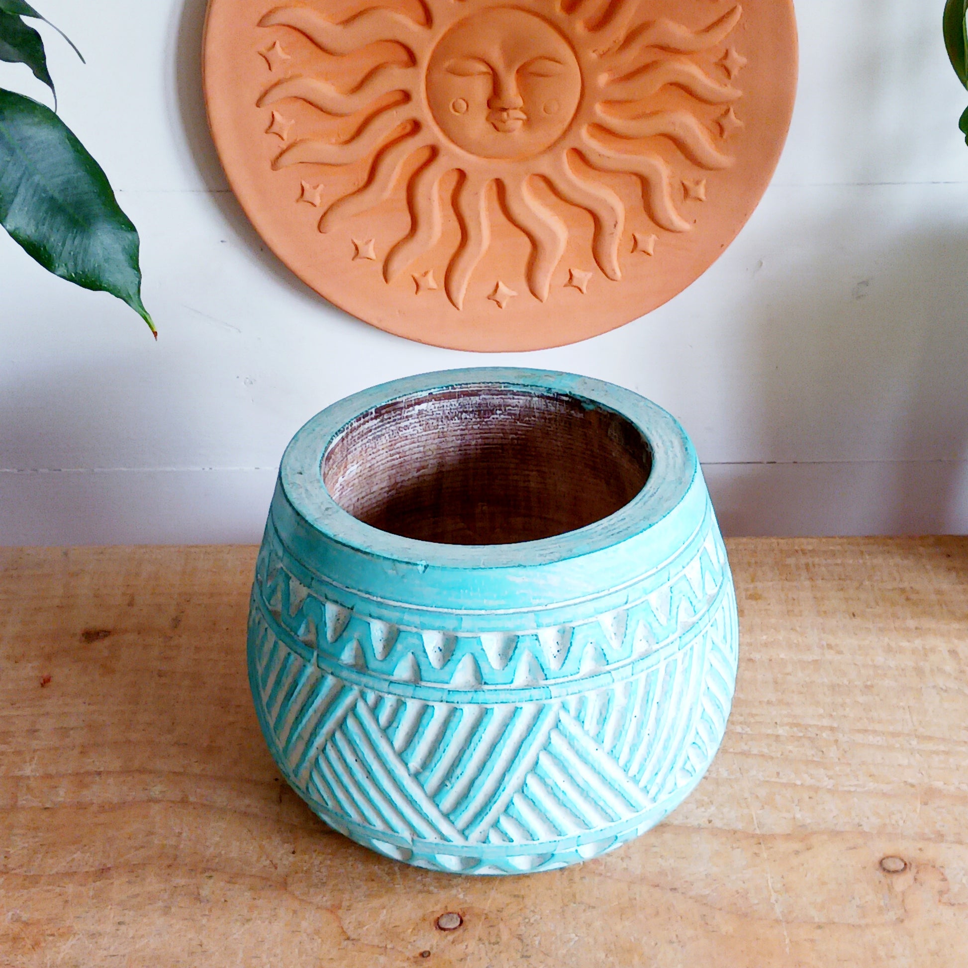 Bring authentic Balinese craftsmanship into your home with this turquoise hand-carved tribal wooden pot. Perfect for storing trinkets, small treasures, or displaying your favourite plants, this versatile pot adds a touch of boho charm to any space.