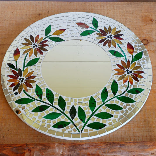Transform any room into a vibrant oasis with our large Handmade Mosaic Floral Mirror. Crafted with care, this stunning mirror features a bright floral mosaic design that instantly adds style and colour to your décor. Perfect as a statement piece for living rooms, bedrooms, hallways, or entryways, it reflects not only light but also personality. Each mirror is uniquely handmade, making it a one-of-a-kind addition to your home.
