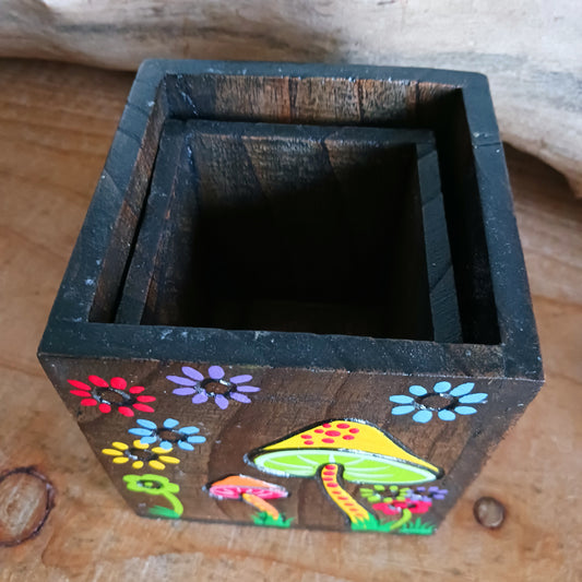 Add a burst of colour and joy to your space with this Hand Painted Mushroom Wooden Pots Set, handmade in Indonesia and Fairtrade certified. Each pot is carefully painted by skilled artisans, making every set unique and full of character.