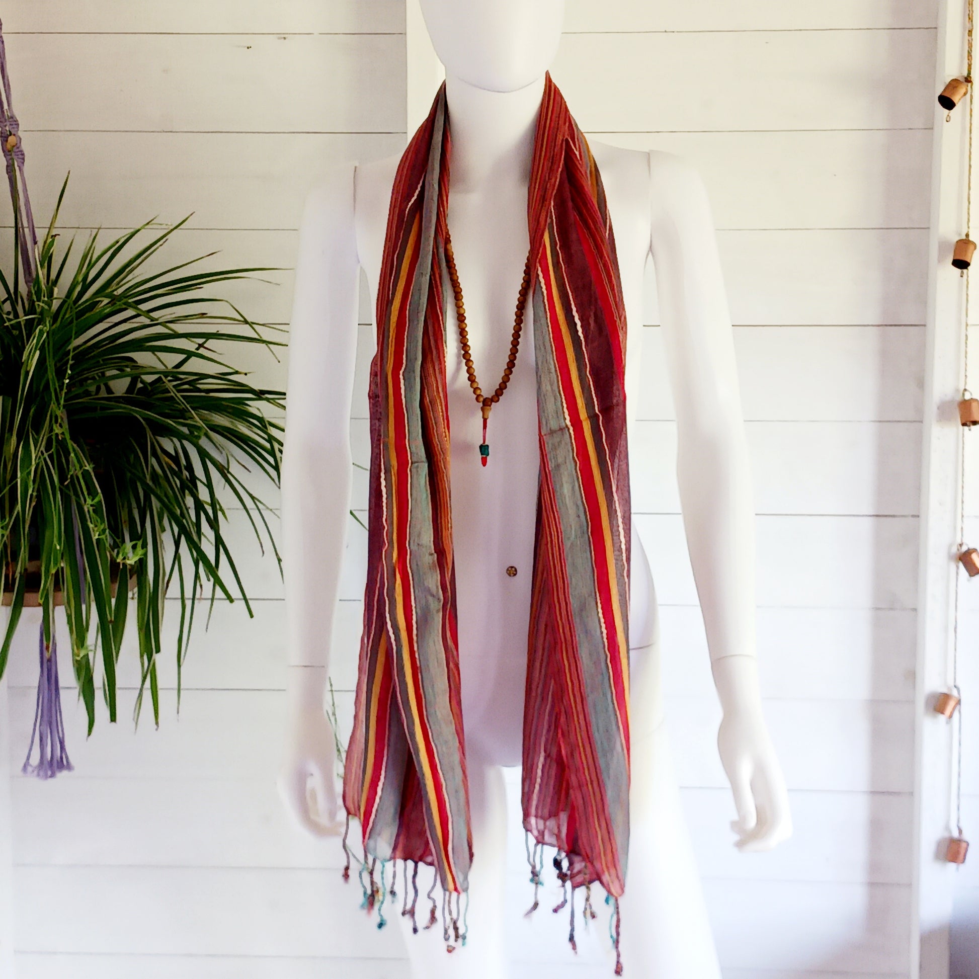 Immerse yourself in the alluring world of bohemian fashion with this delicate Indian Boho Scarf. Crafted with care, each scarf captures the essence of India's free-spirited charm, adding a touch of Boho elegance to your outfit. Whether draped effortlessly over your shoulders, wrapped as a headscarf, or styled with creative knots, this versatile accessory enhances your everyday fashion. Lightweight, breathable, and full of personality, it’s the perfect way to express your unique style.